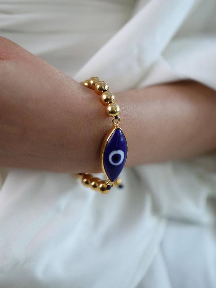 Blue evil eye bracelet in Gold