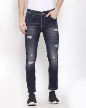 Lightly-Washed Distressed Slim Jeans