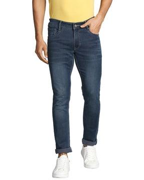 Lightly-Washed Tapered Jeans with Roll-Up Hem